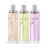 Foto del paquete de capas Starlicious the yummy swirl para combinar en capas con Pineapple Musk, Pistachio Praline y Berry Licorice: frascos de vidrio con una estrella fugaz tallada, cuyas facetas brillan bajo un elegante tapón plateado.